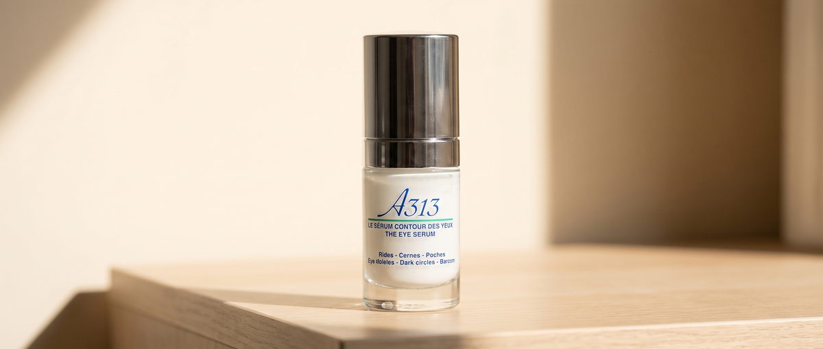 Close-up of the A313 Eye Serum bottle and cap on a soft light background